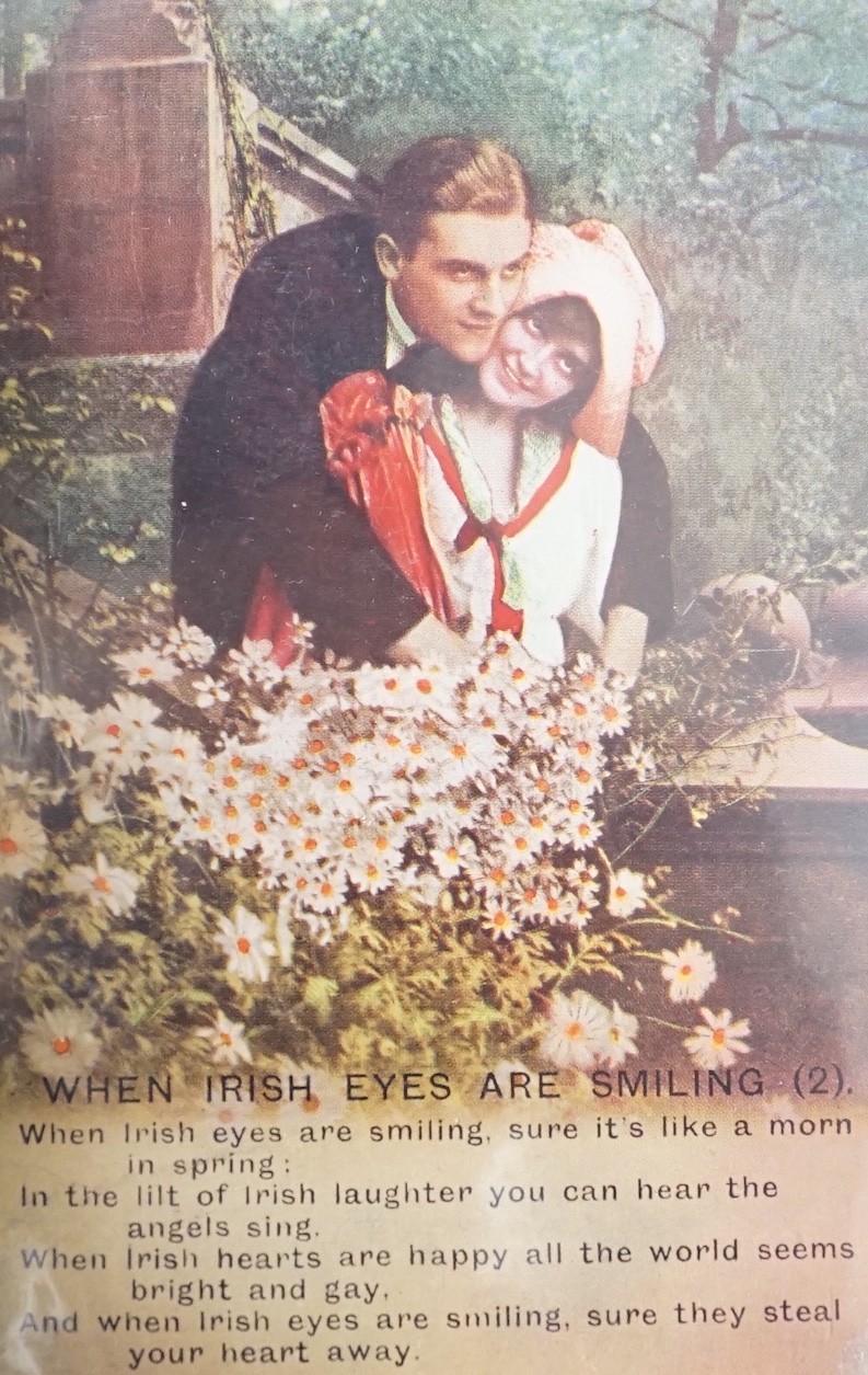 Postcards in three albums plus loose with seventy six Bamforth cards, Sussex with Brighton cards, postmarks, early stage and screen stars